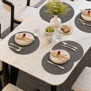 Charcoal | Charcoal Concentric Woven Round Polyester Placemats styled on a dining table