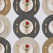 Charcoal | Concentric Woven Round Polyester Placemats multi-color dining table arrangement with Charcoal featured